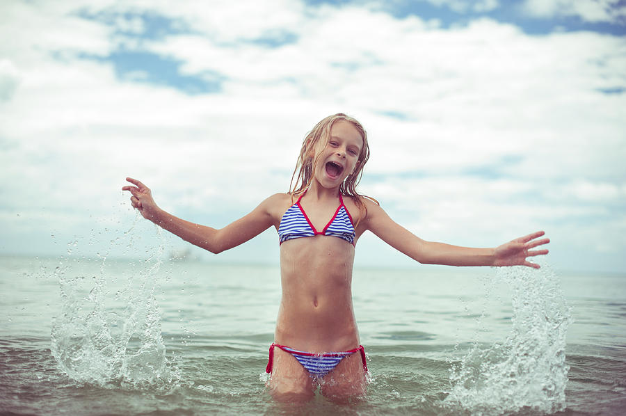 Girl frisking in the sea Photograph by Photographer Irina Sidorenko