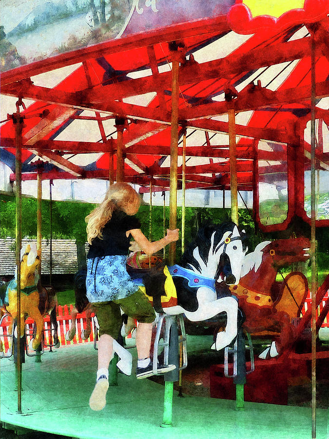 Girl Getting on Merry-Go-Round Photograph by Susan Savad