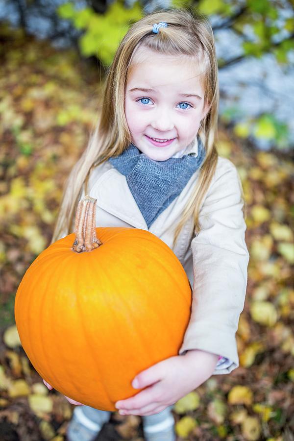 Girl Holding Pumpkin Photograph by Science Photo Library - Fine Art America