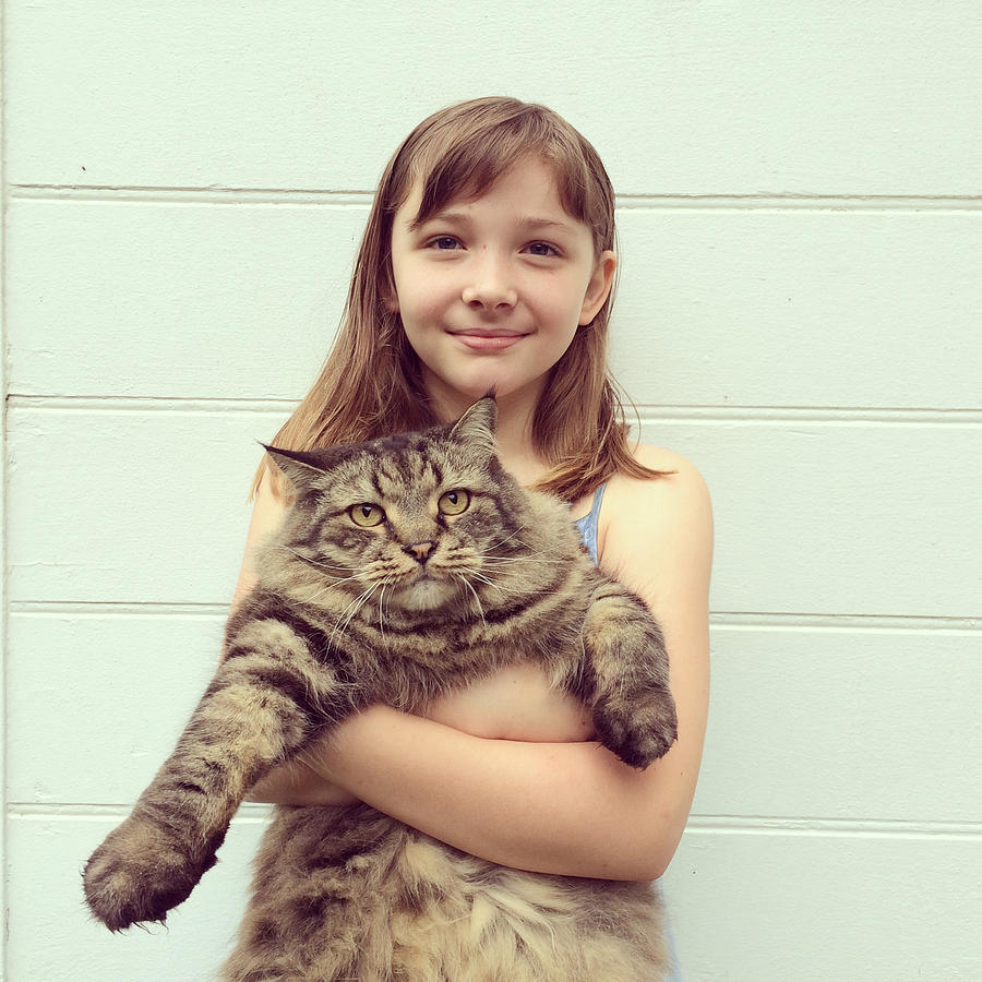 Girl Hugging Cat Photograph by Cyndi Monaghan
