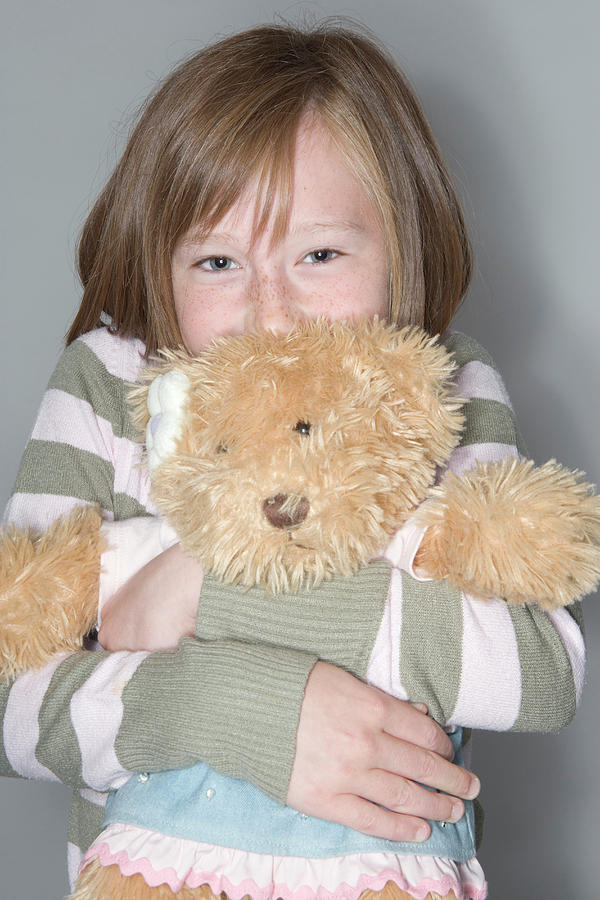 Teddy Bear Photograph - Girl Hugging Her Teddy Bear by Gustoimages/science Photo Library