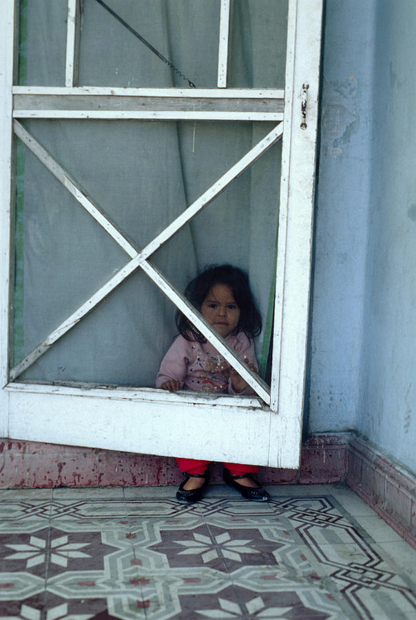 Girl In Doorway Photograph By Mark Goebel 8167