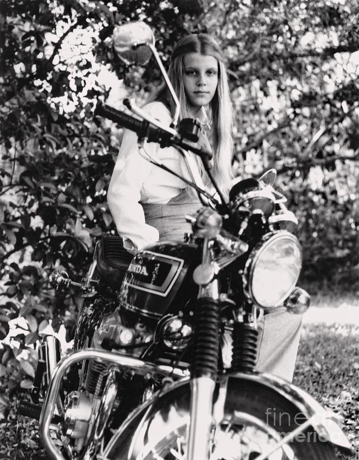 Vintage Photograph - Girl Motorcycle Young - Nymph Sits Atop Motorcycle by Wayne Nielsen