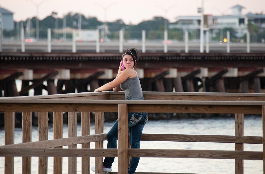 Girl On A Pier Photograph by John Black
