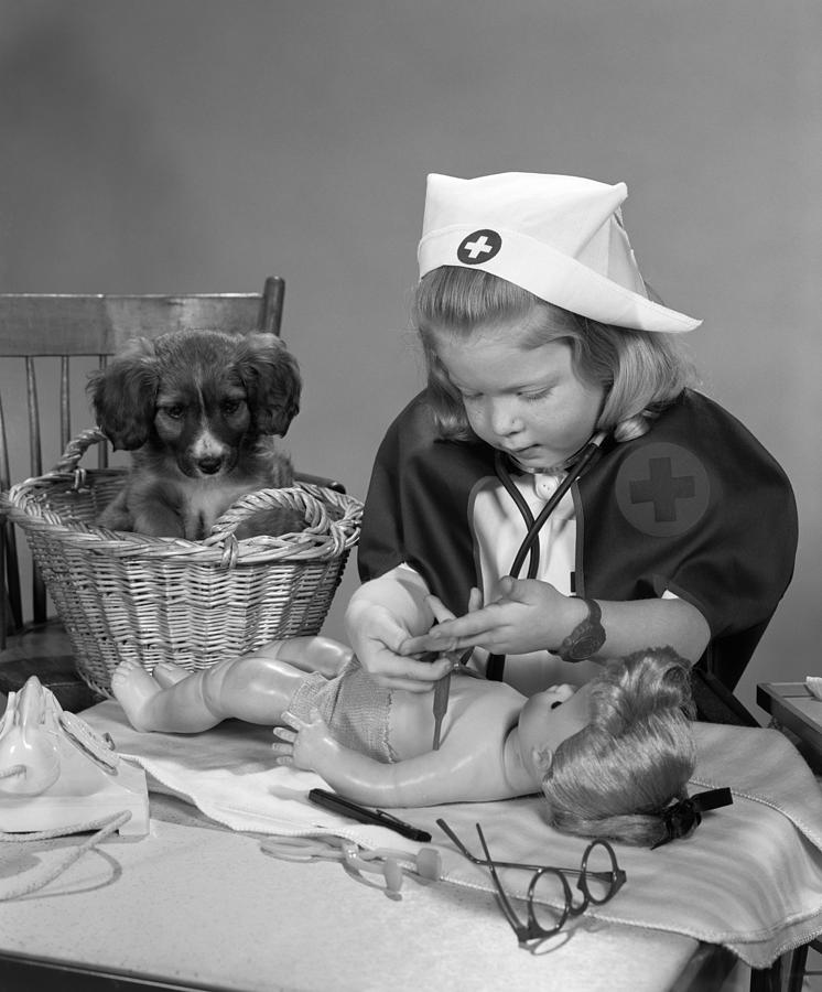 Girl Playing Doctor, C.1950s Photograph by H. Armstrong Roberts/ClassicStock