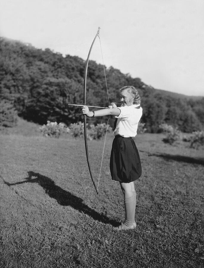 Girl Scout With Bow And Arrow Photograph by Underwood Archives - Fine ...
