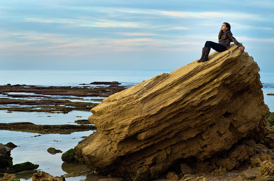 Girl Sitting On A Rock By The Sea Photograph by Ilan Shacham