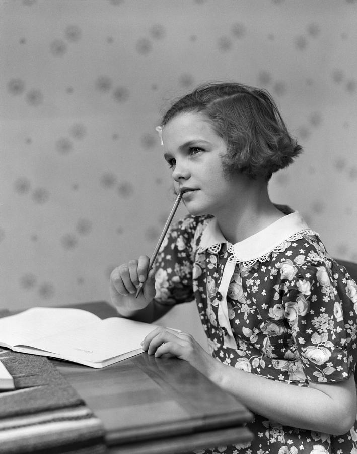 Girl Thinking Over Homework, C.1930s Photograph by H. Armstrong Roberts/ClassicStock