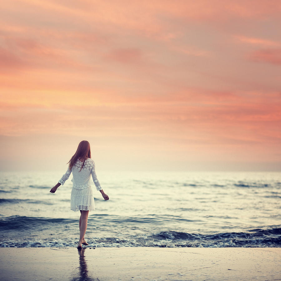Girl Walking On The Beach At Sunset Photograph by Mammuth