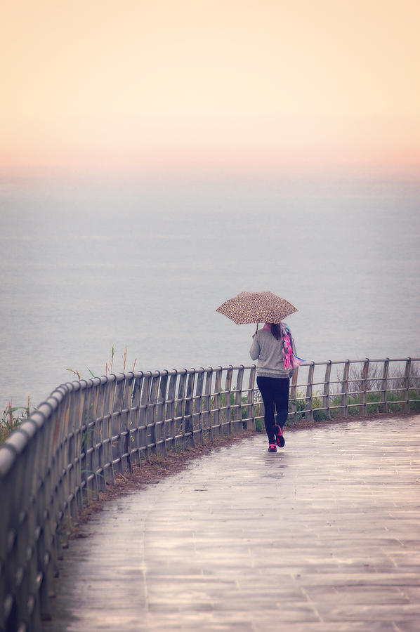 Girl Walking With Umbrella Photograph by Mikel Martinez de Osaba