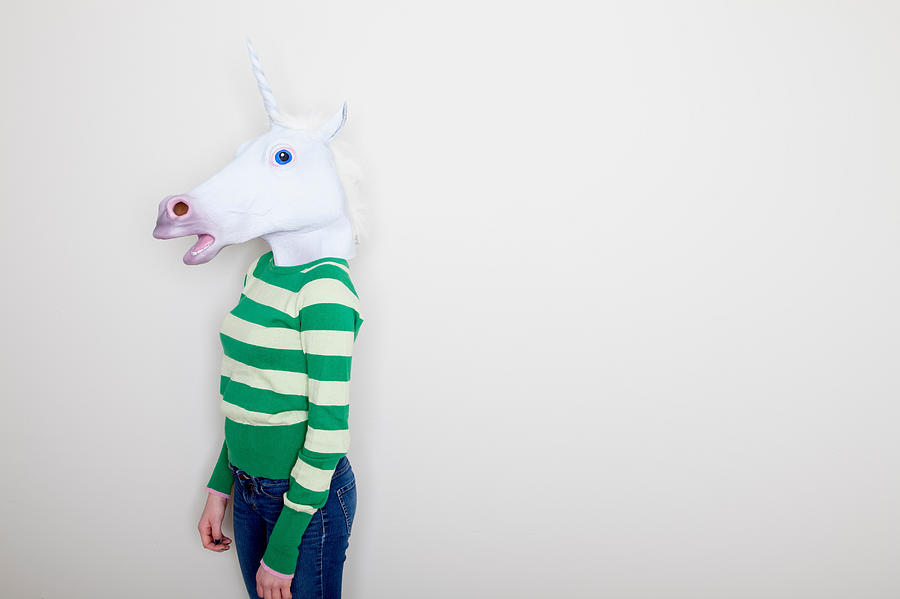 Girl wearing unicorn head Photograph by Davidgoldmanphoto