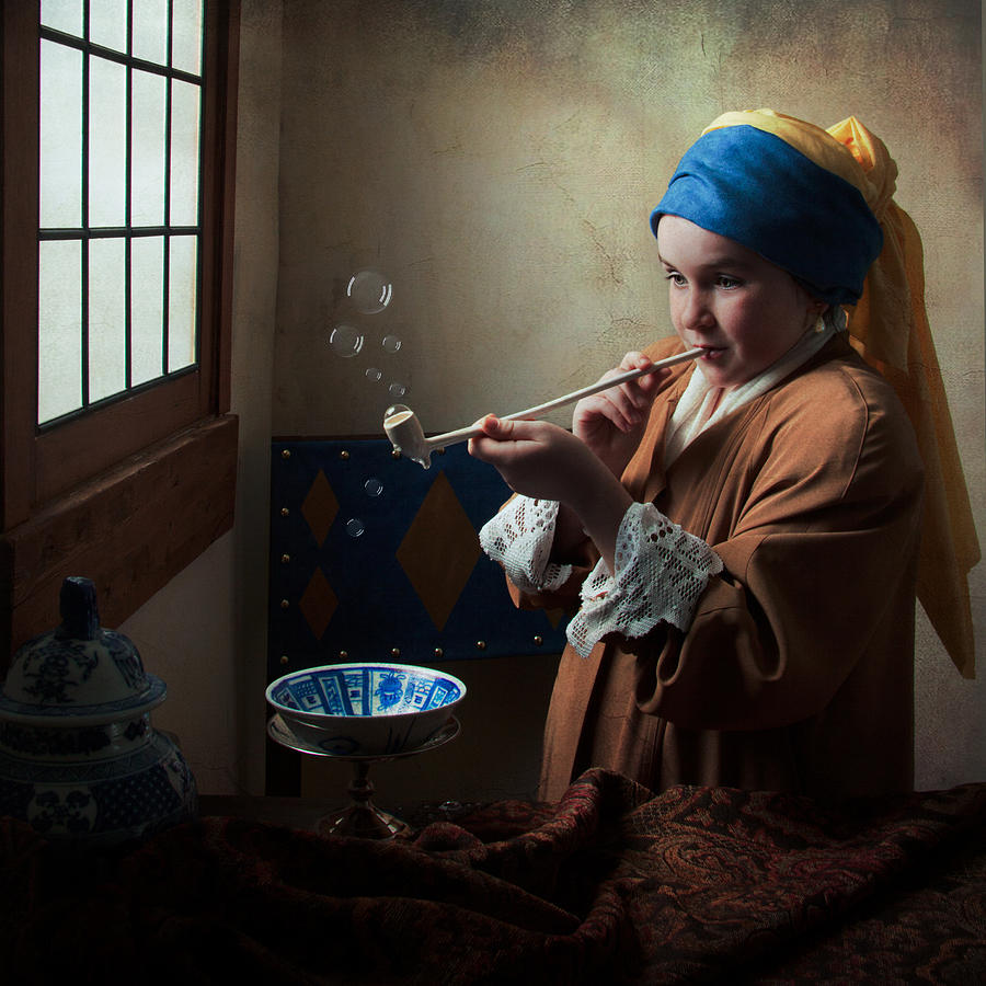 Girl with a Pearl Earring blowing bubbles Photograph by Levin Rodriguez