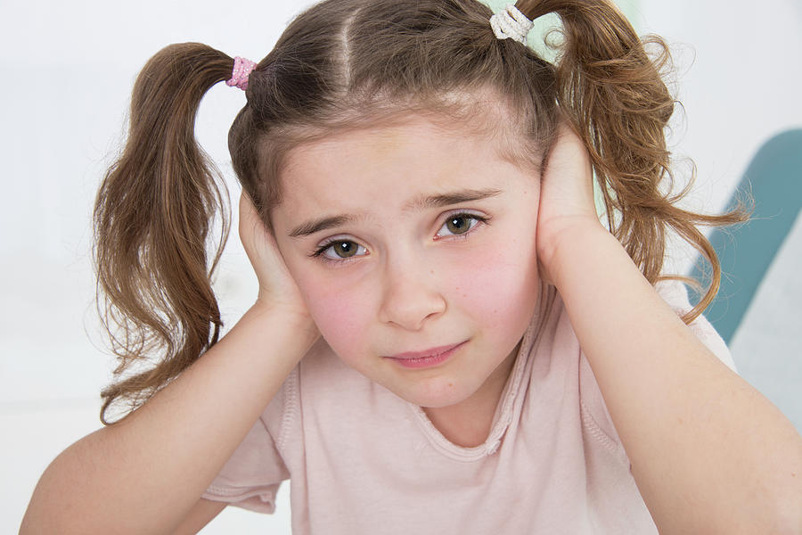 Girl With Her Hands Over Her Ears Photograph by Lea Paterson Fine Art