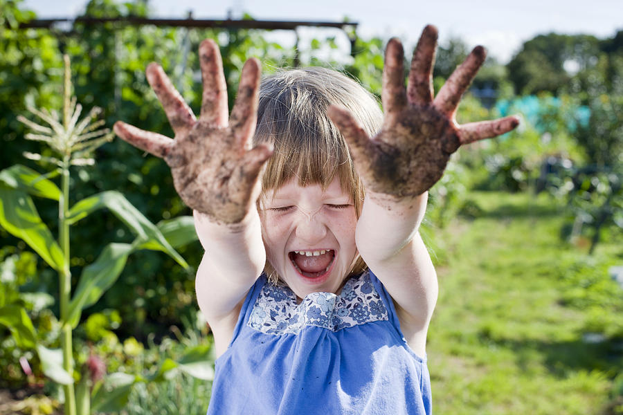 Girl with muddy hands Photograph by Jw Ltd