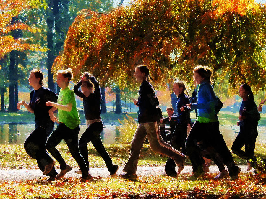 Girls Jogging On an Autumn Day Photograph by Susan Savad