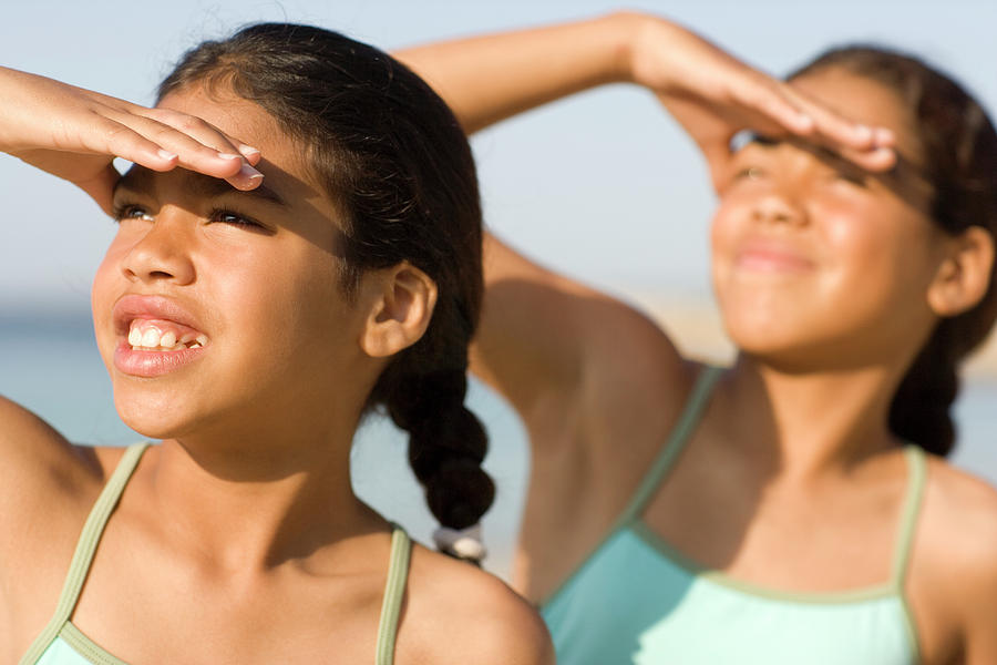 Girls Shading Their Eyes Photograph by Ian Hooton/science Photo Library
