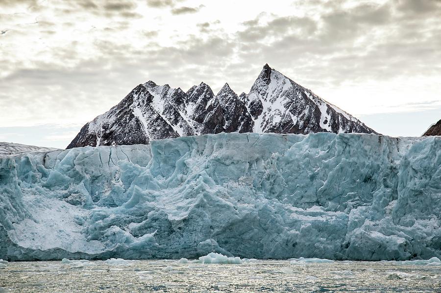 Glacial Ice Cliff Photograph by Peter J. Raymond