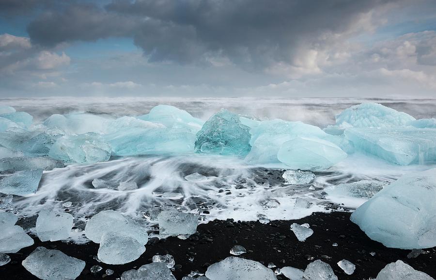 Glacial Ice On Volcanic Beach Photograph by Jeremy Walker