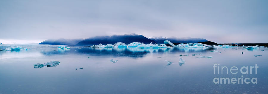 Glacial lake with icebergs at sunrise Iceland Photograph by Matteo Colombo