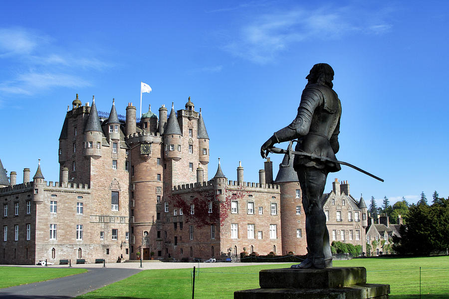 Glamis Castle with Statue Photograph by Jason Politte