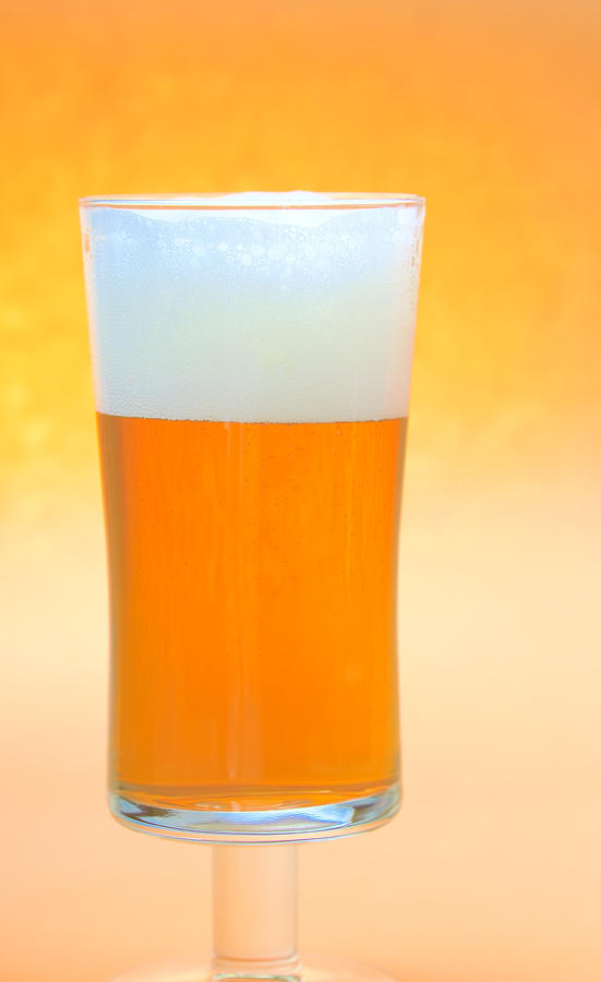 Glass of beer Photograph by Marek Poplawski