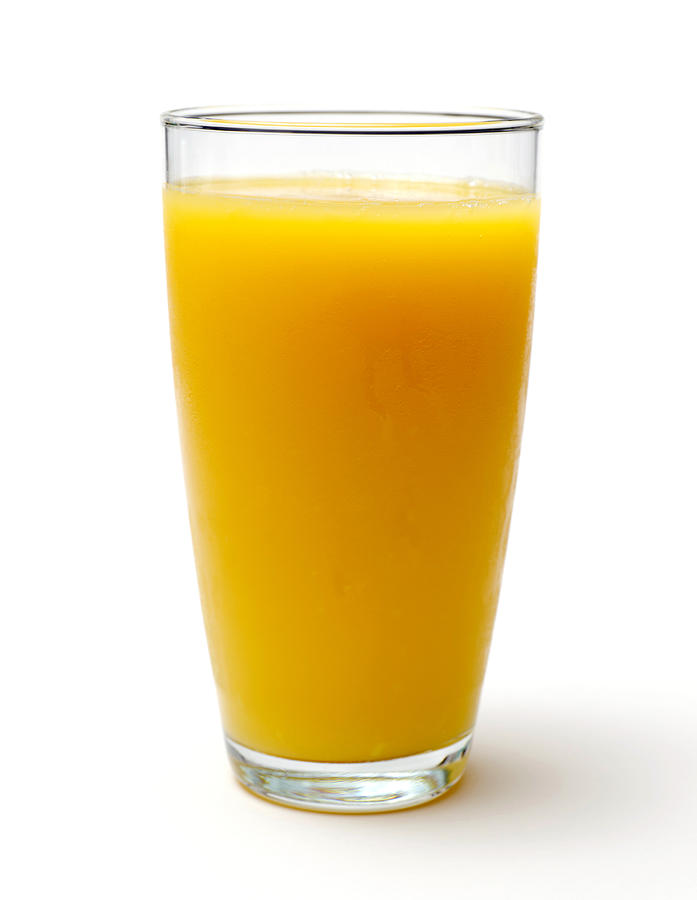 Glass of Orange Juice Photograph by Dlerick