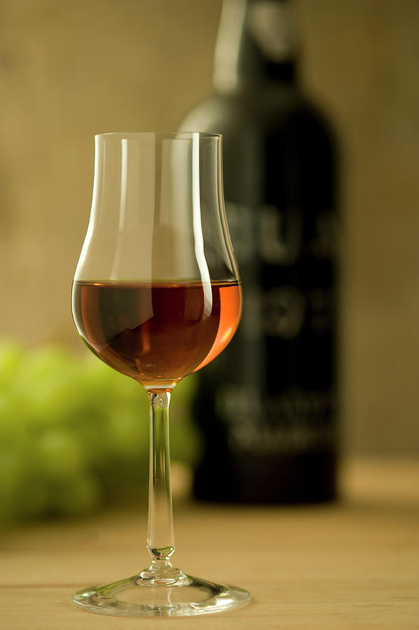 Glass Of Sherry Or Madeira Wine Photograph by Kontrast-fotodesign