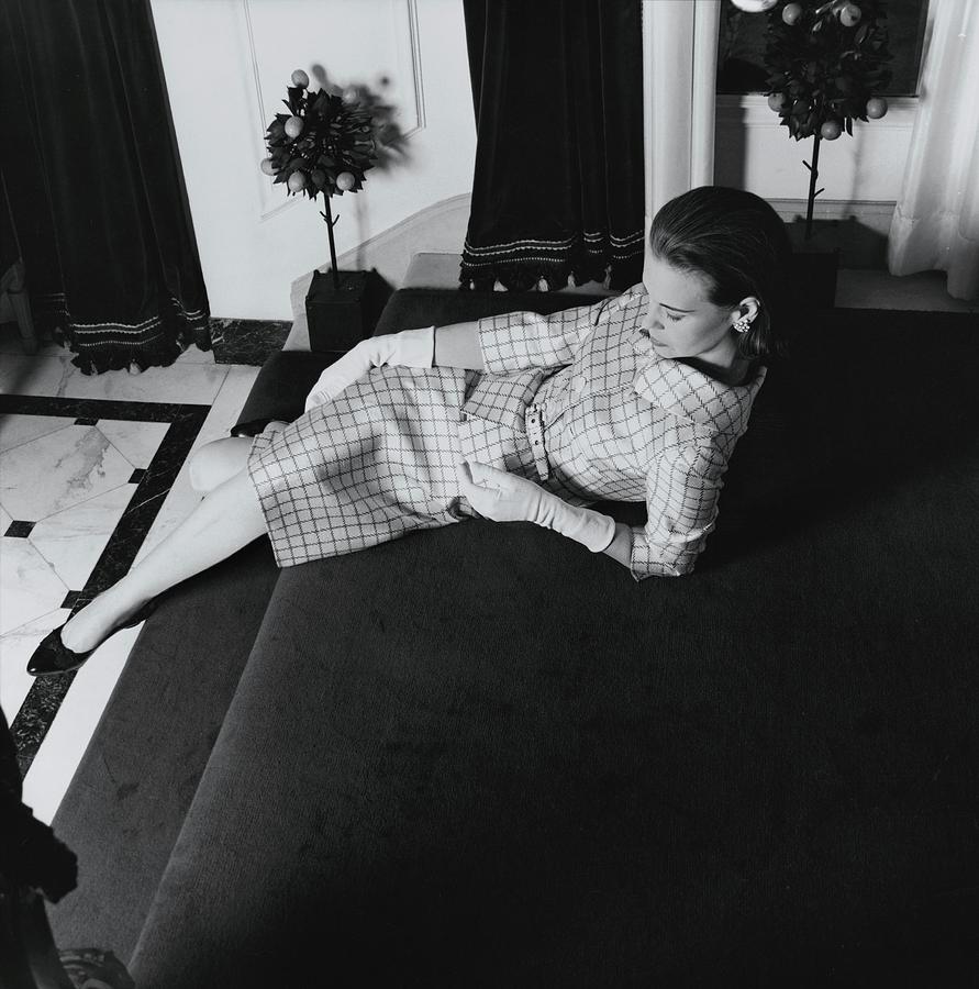 Gloria Vanderbilt Reclining On A Staircase Photograph by Horst P. Horst