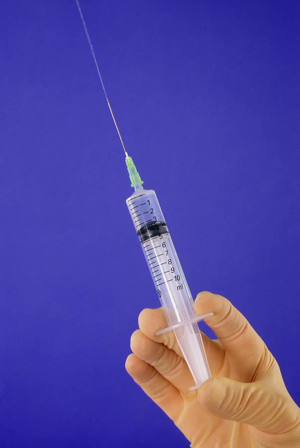 Gloved Hand Gently Squeezing A Syringe Photograph by Claire Paxton & Jacqui Farrow/science Photo Library