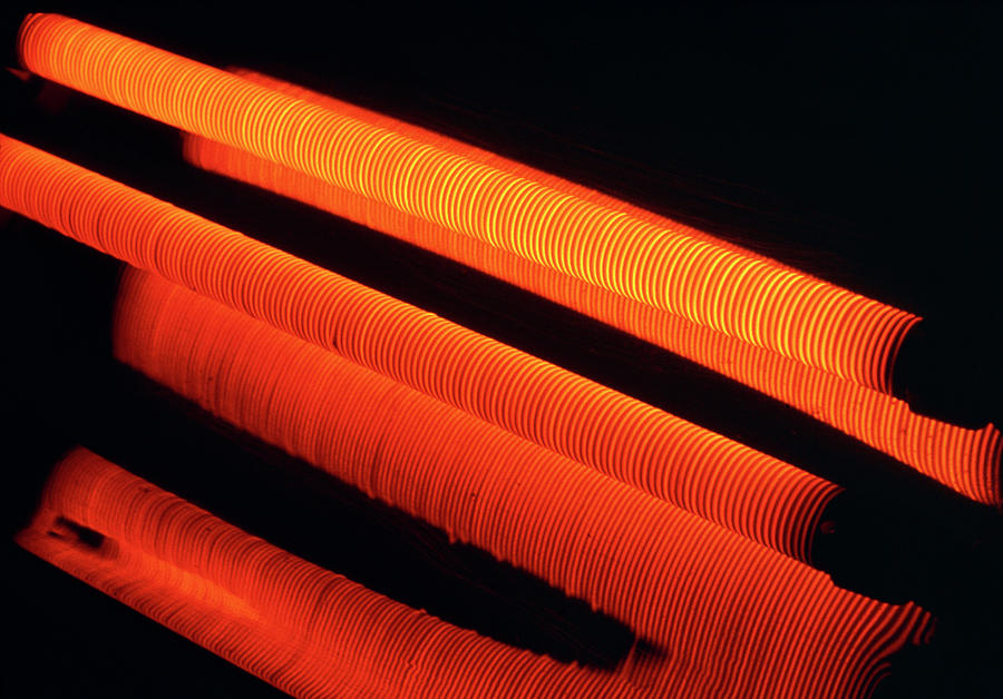 Glowing Filaments Of The Bars Of An Electric Fire Photograph by Jerry Mason/science Photo Library