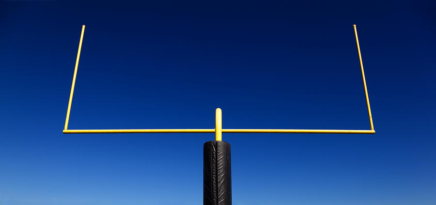 Goal Post Against Blue Sky Photograph by Slobo
