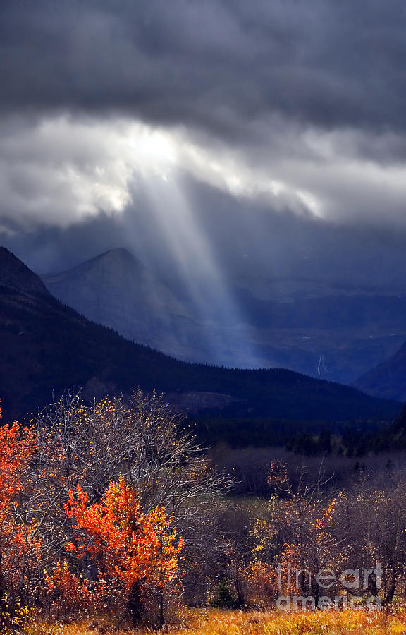 God Rays over Many Glacier Photograph by Deby Dixon