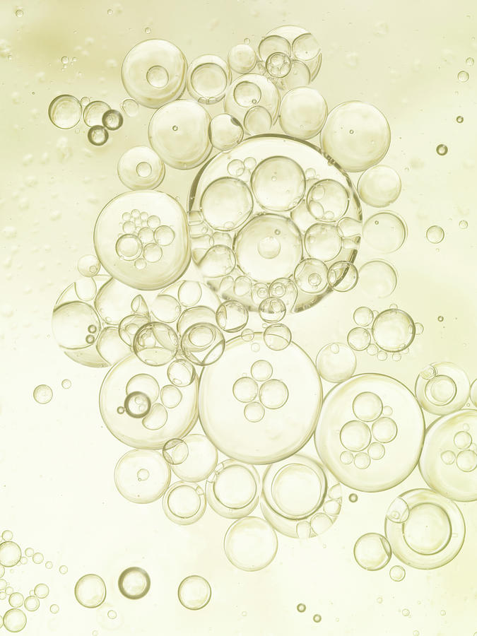 Gold Bubbles Of Oil And Water Photograph by Level1studio