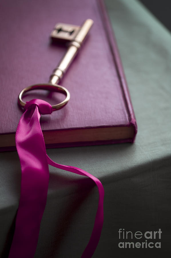 Gold Key With Pink Ribbon On A Vintage Book Photograph by Lee Avison