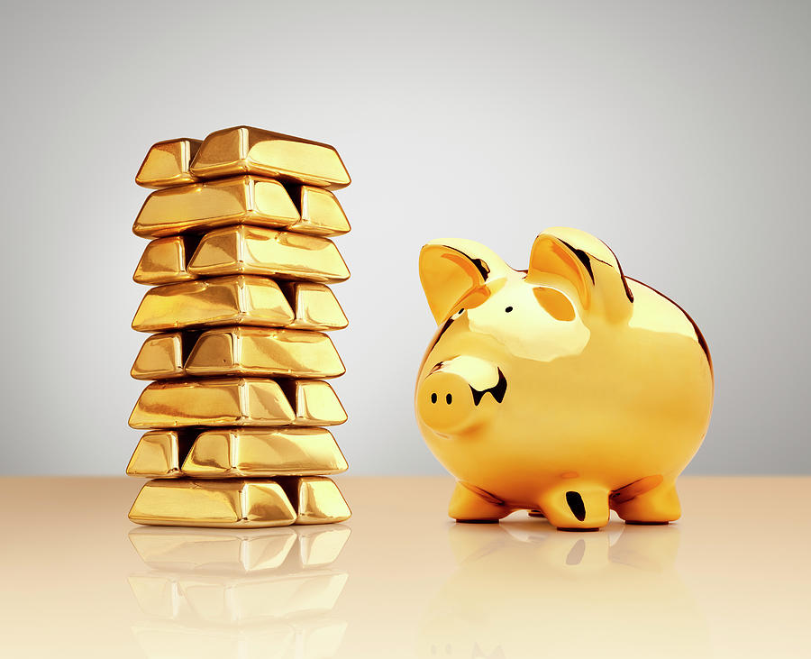 Gold Piggy Bank Beside A Stack Of Ingots by Anthony Bradshaw