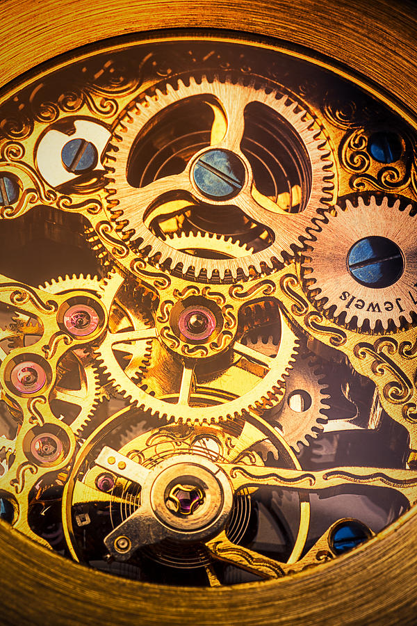 Gold pocket watch gears Photograph by Garry Gay