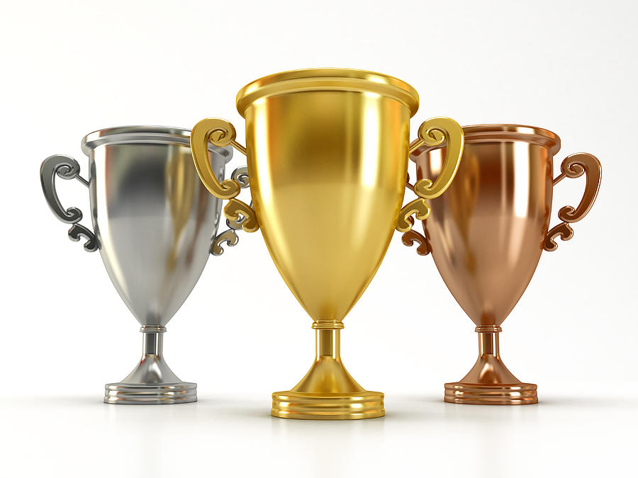 Gold, silver and bronze cups Photograph by Adventtr