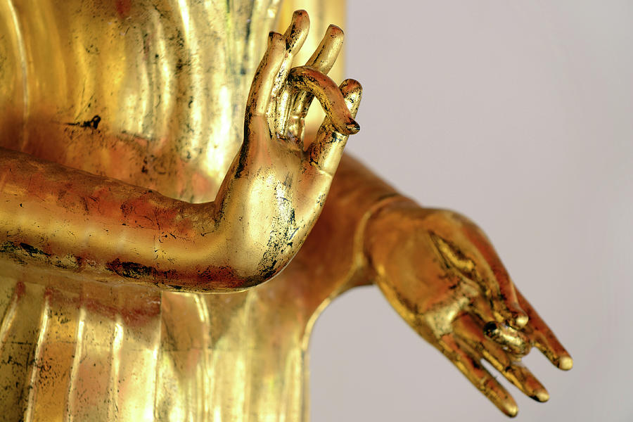 Golden Buddha Hand Close-up Photograph by Dangdumrong