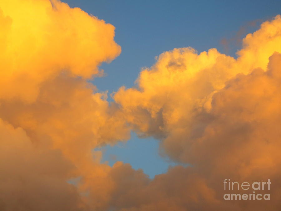 Golden Cloud Patterns at Sunset. Photograph by Robert Birkenes