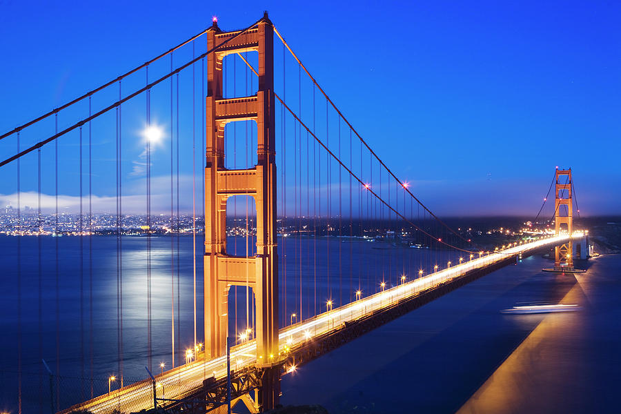 Golden Gate Bridge At Dusk With Moon In By Orien Harvey