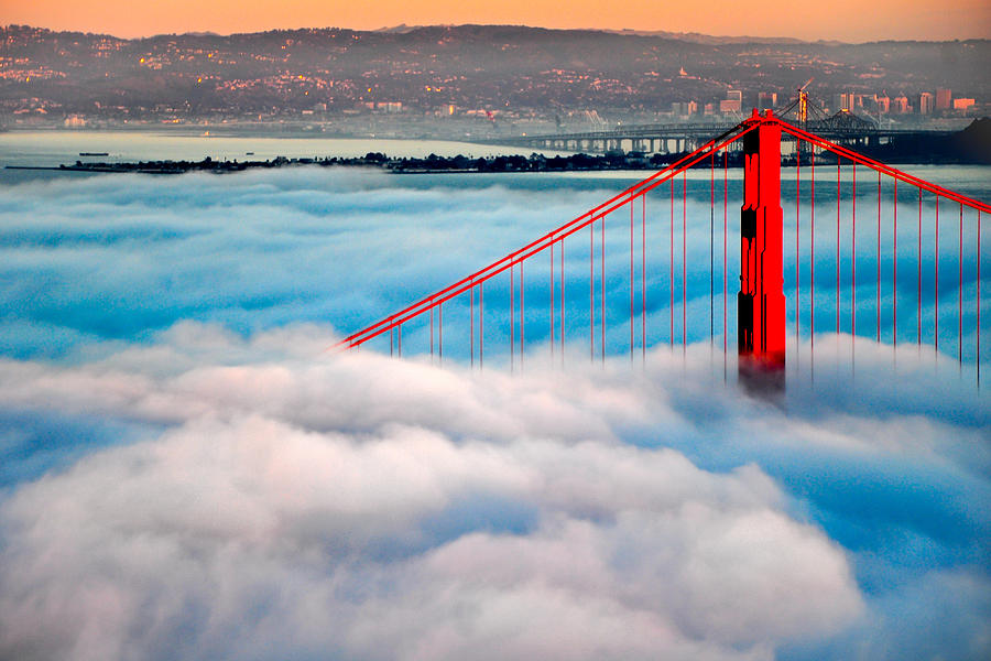 Golden Gate Bridge in Fog Photograph by Joel Thai