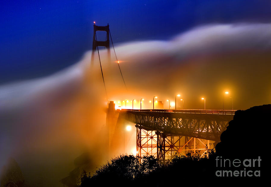Golden Gate Bridge in the night fog Photograph by Wernher Krutein