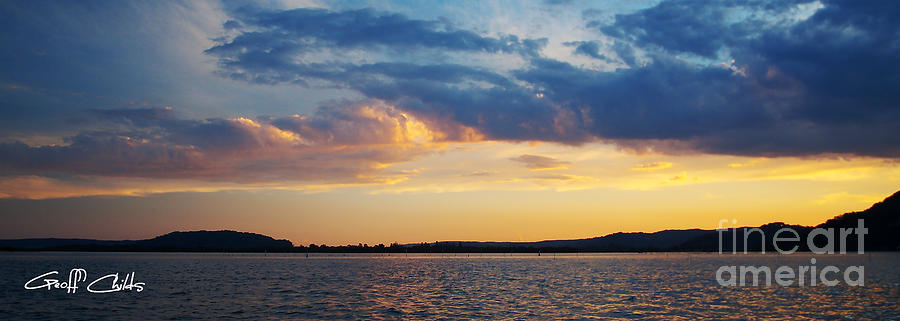 Golden Horizon - Sunset over Woy Woy and Koolewong. Brisbane waters. Photograph by Geoff Childs