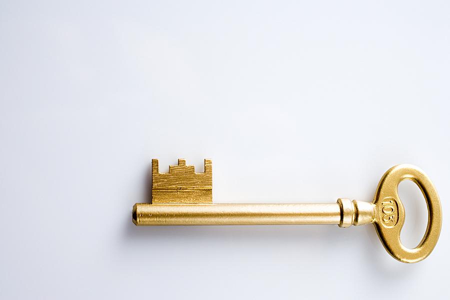 Golden key Photograph by Image Source