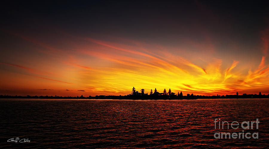 Golden Sunrise Over Coastal Lake Photograph