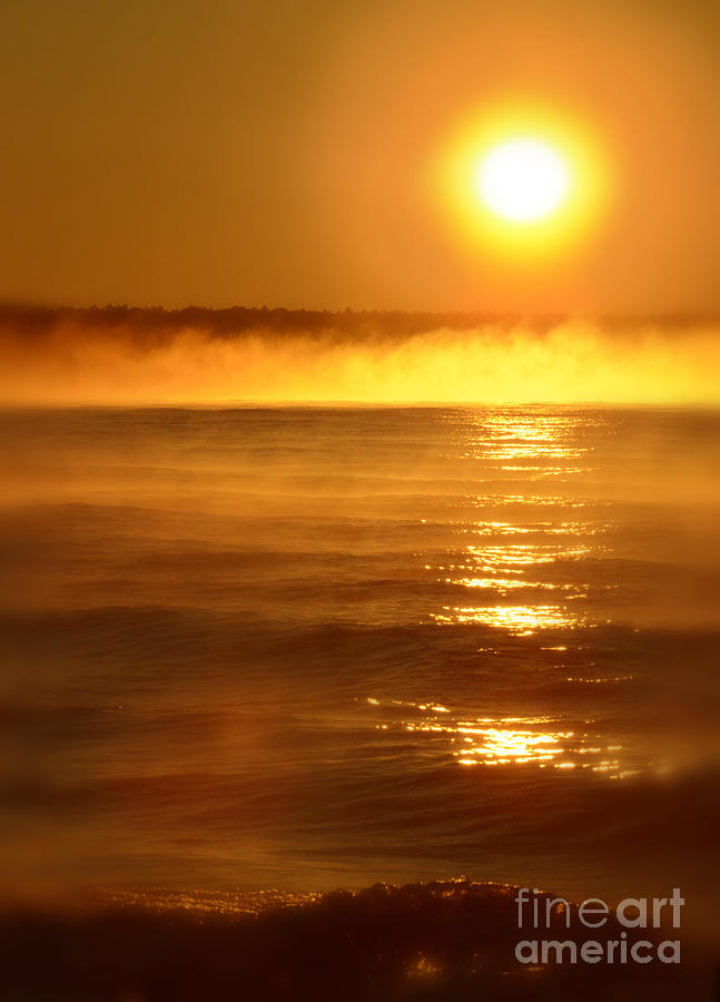 sunrises over water