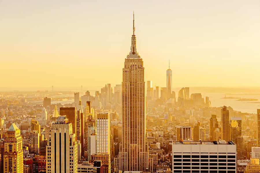 Golden sunset in Manhattan, New York City, USA Photograph by Alexander Spatari