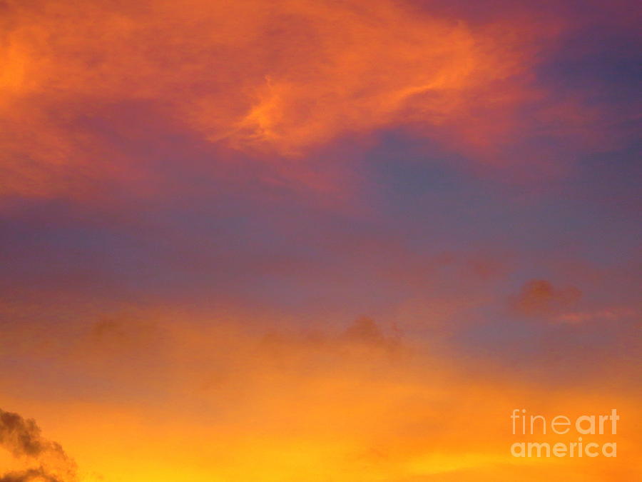 Golden Yellow and Blue Velvety Clouds at Sunset. Photograph by Robert Birkenes