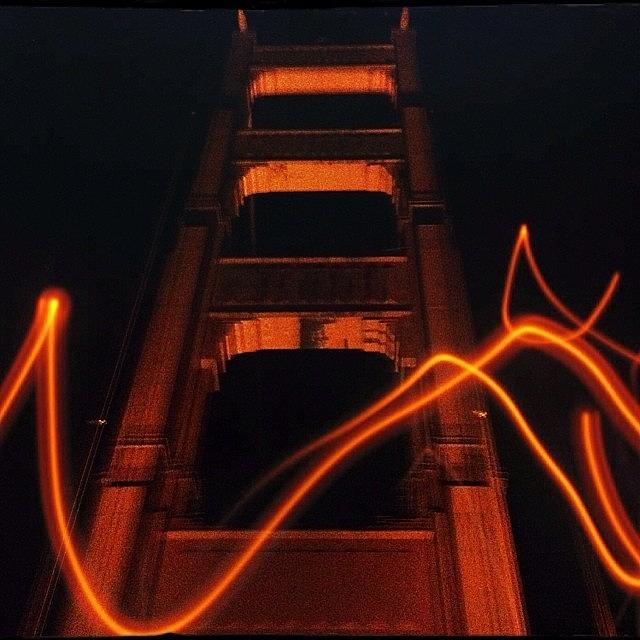 Landmark Photograph - Golden Gate Bridge red light at night by Eugene Evon
