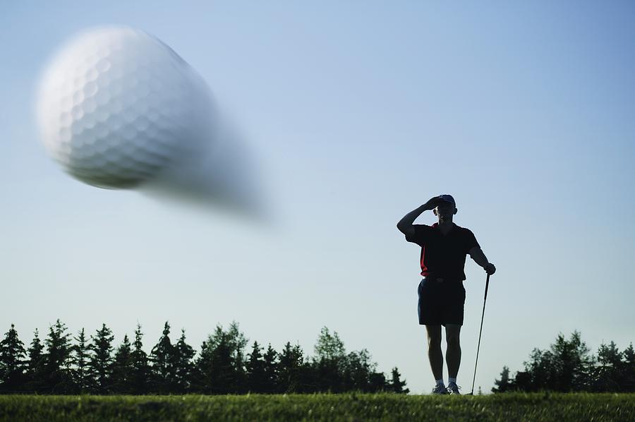 Golf Photograph - Golf Ball In Flight by Kelly Redinger